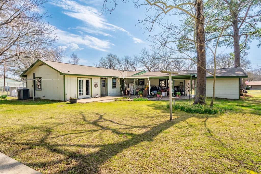 609 East Quitman Street Alba, TX 75410 - Photo 8 of 34 a view of house with outdoor space and swimming pool