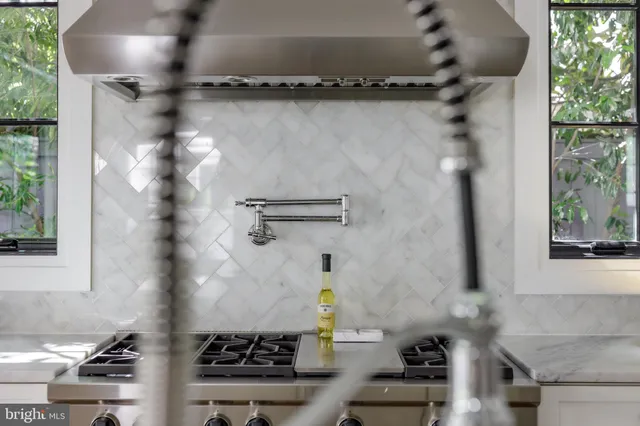 a bathroom with a shower and a stove