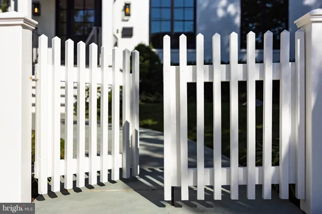 a view of wooden fence of a house