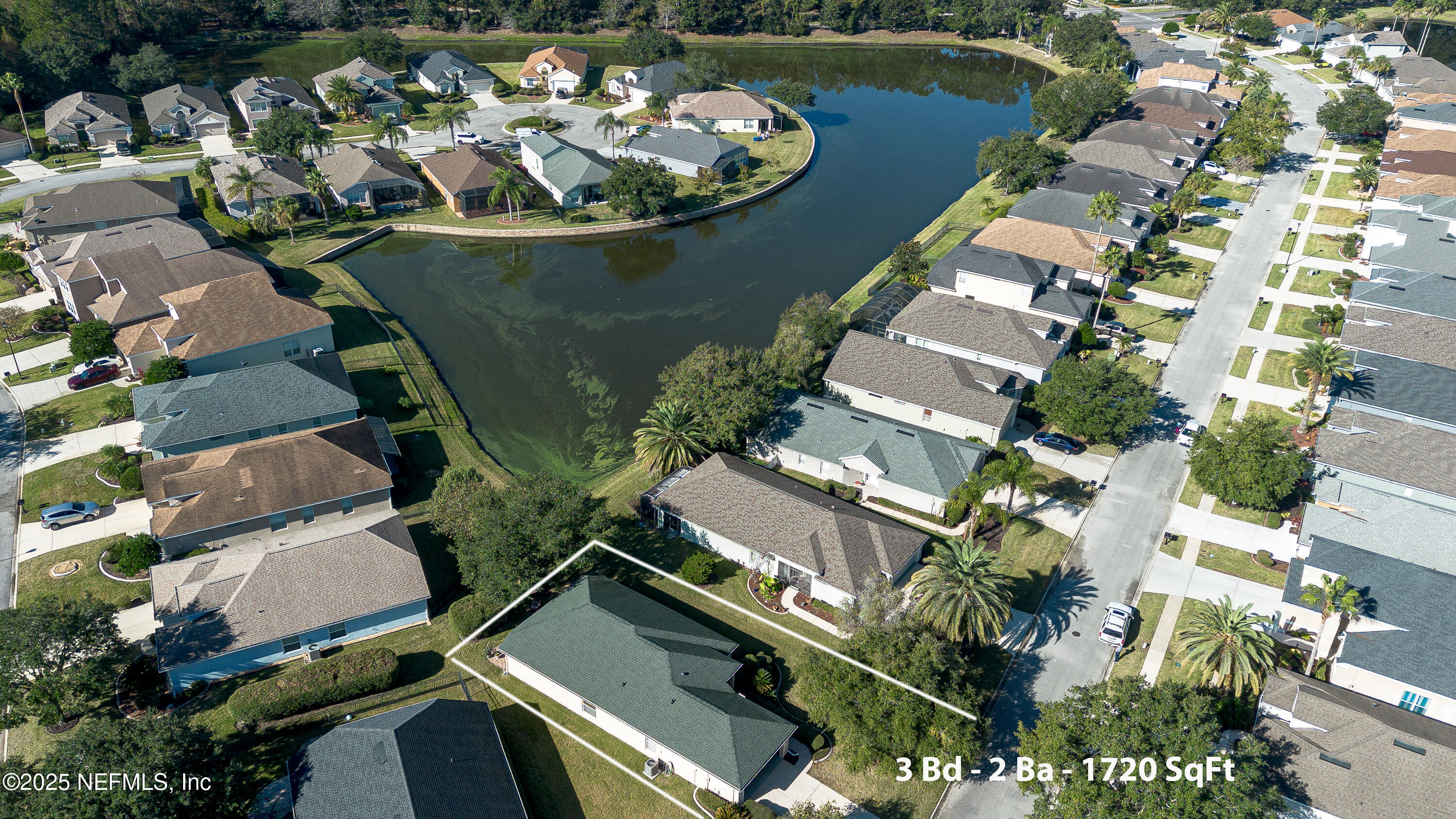 1325 Fairway Village Drive Fleming Island, FL 32003 - Photo 27 of 36 an aerial view of a house with a lake view