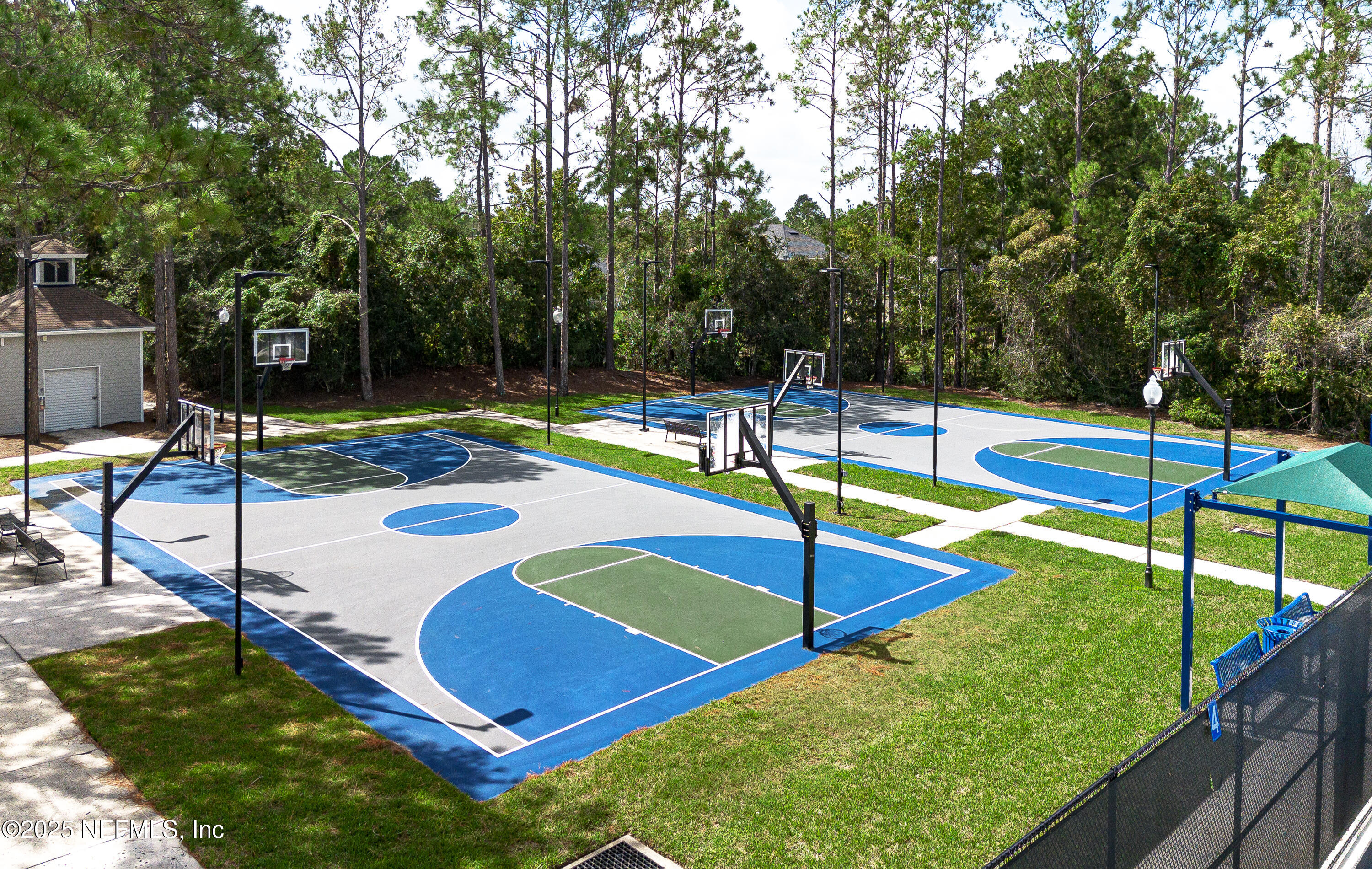 1325 Fairway Village Drive Fleming Island, FL 32003 - Photo 32 of 36 a view of a backyard with swimming pool