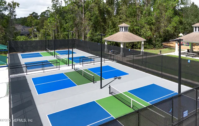 a front view of house with yard and staircase