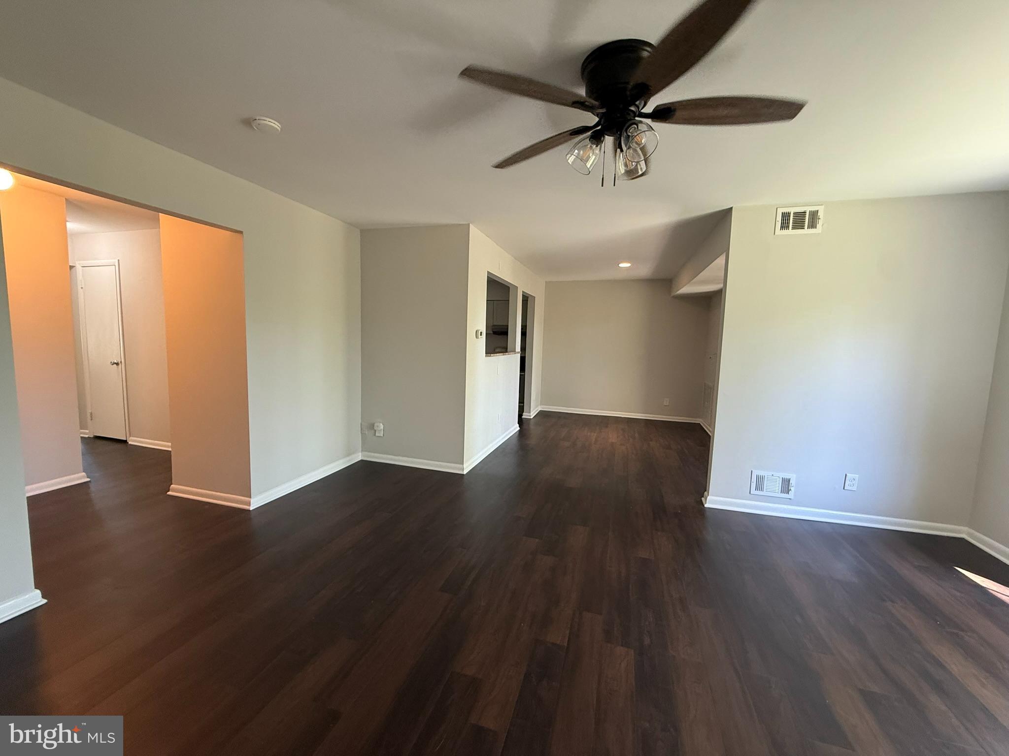 123 Echelon Road Voorhees, NJ 08043 - Photo 13 of 23 a view of an empty room with a window and wooden floor