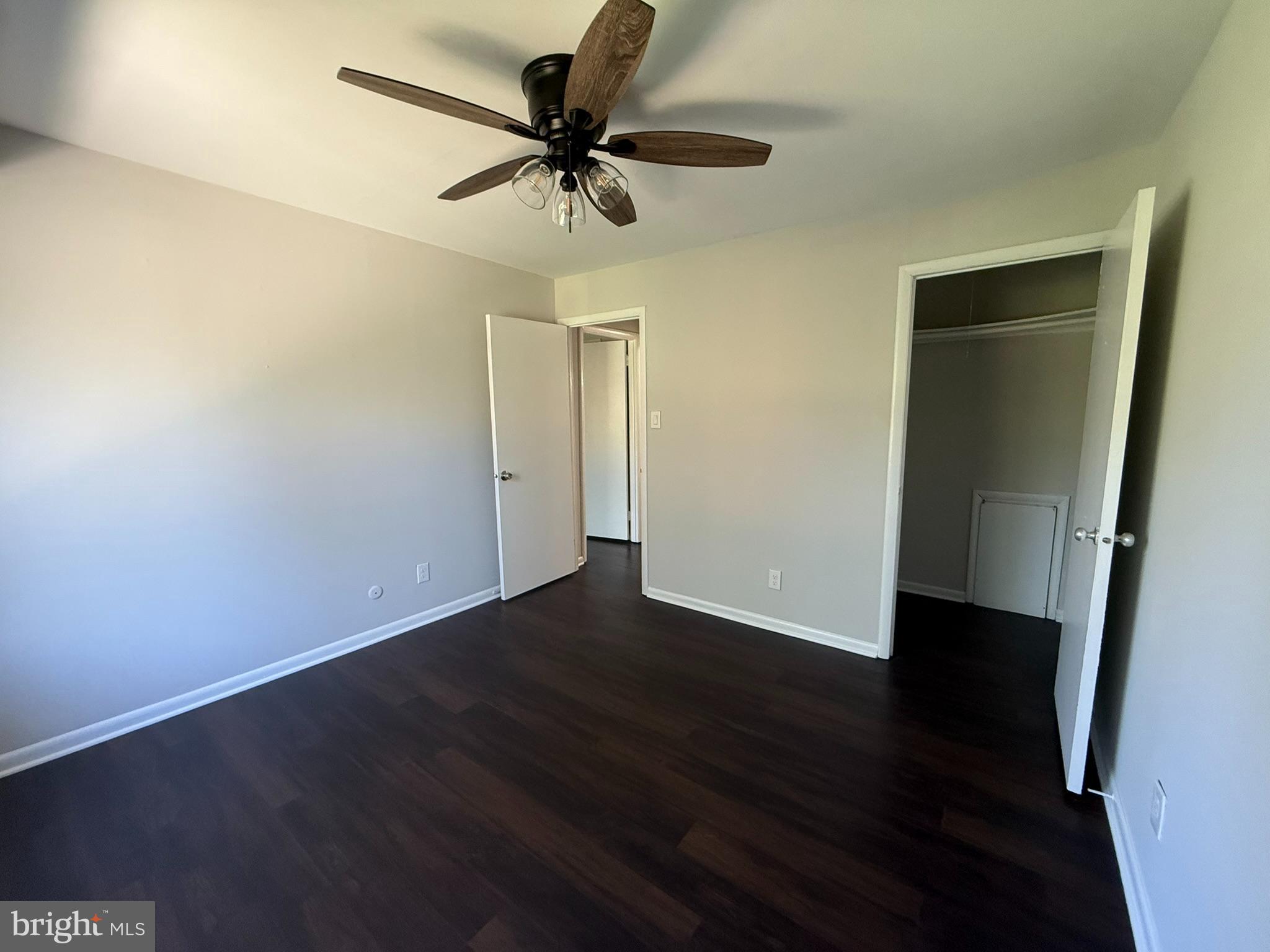 123 Echelon Road Voorhees, NJ 08043 - Photo 17 of 23 an empty room with wooden floor closet and fan