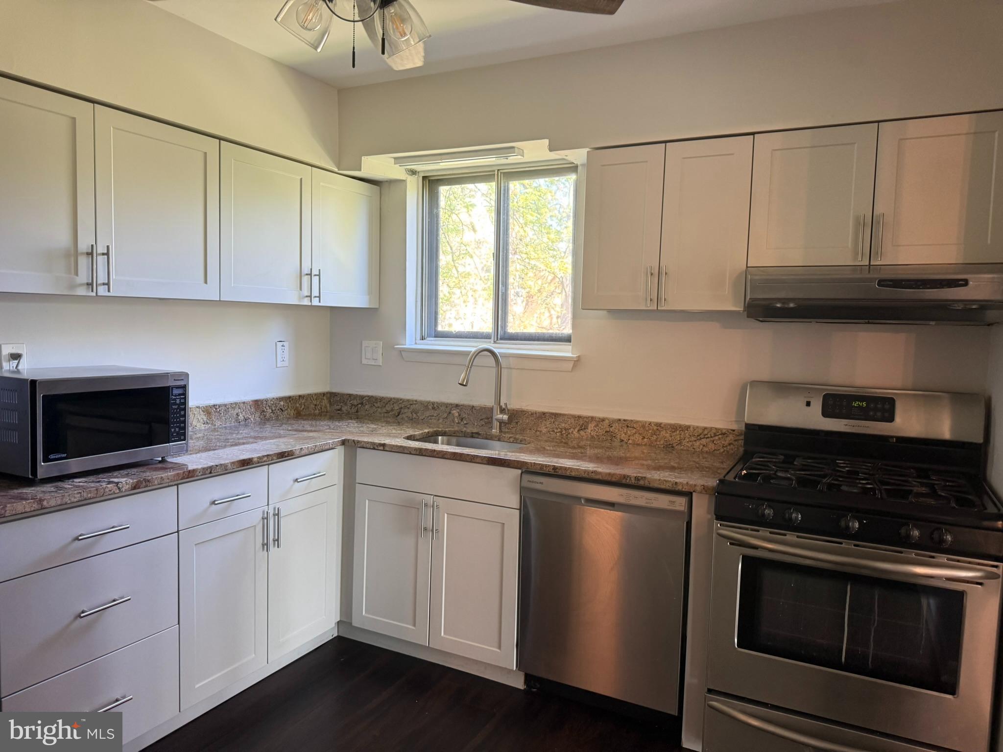 123 Echelon Road Voorhees, NJ 08043 - Photo 5 of 23 a kitchen with white cabinets stainless steel appliances and sink