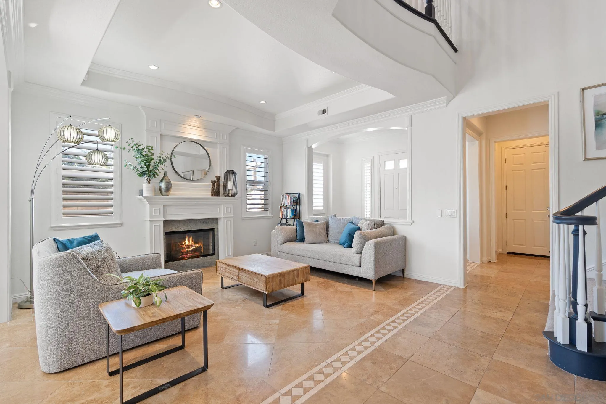 2887 Corte Morera Carlsbad, CA 92009 - Photo 13 of 68 a living room with furniture and a fireplace