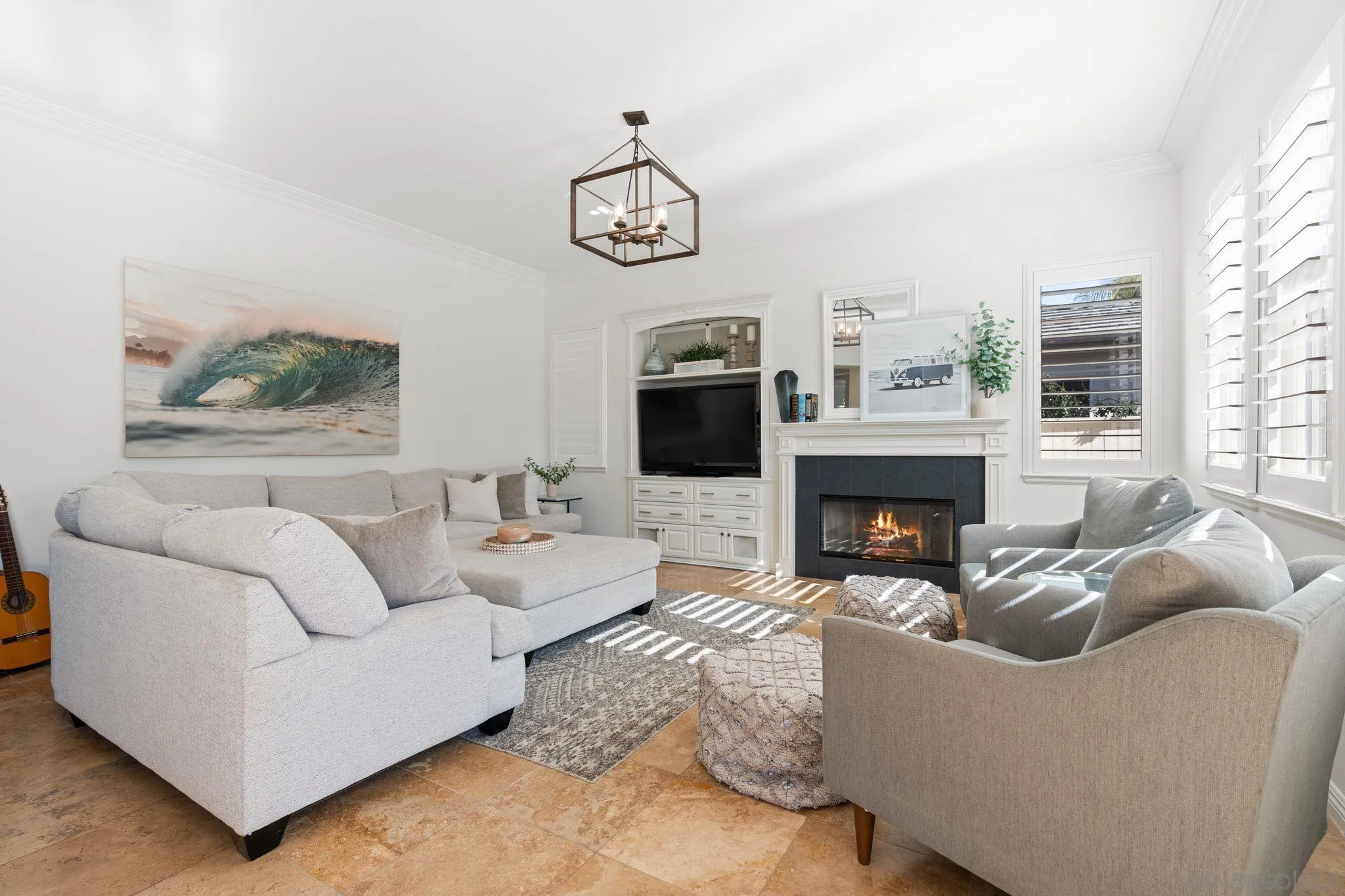 2887 Corte Morera Carlsbad, CA 92009 - Photo 25 of 68 a living room with furniture a fireplace and a flat screen tv