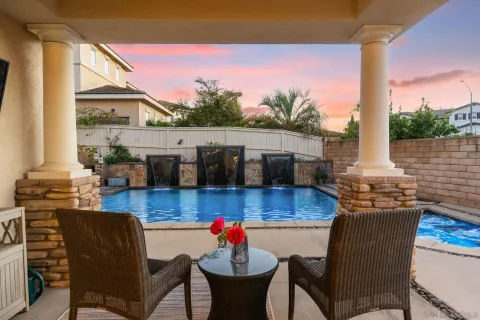 a view of a house with swimming pool