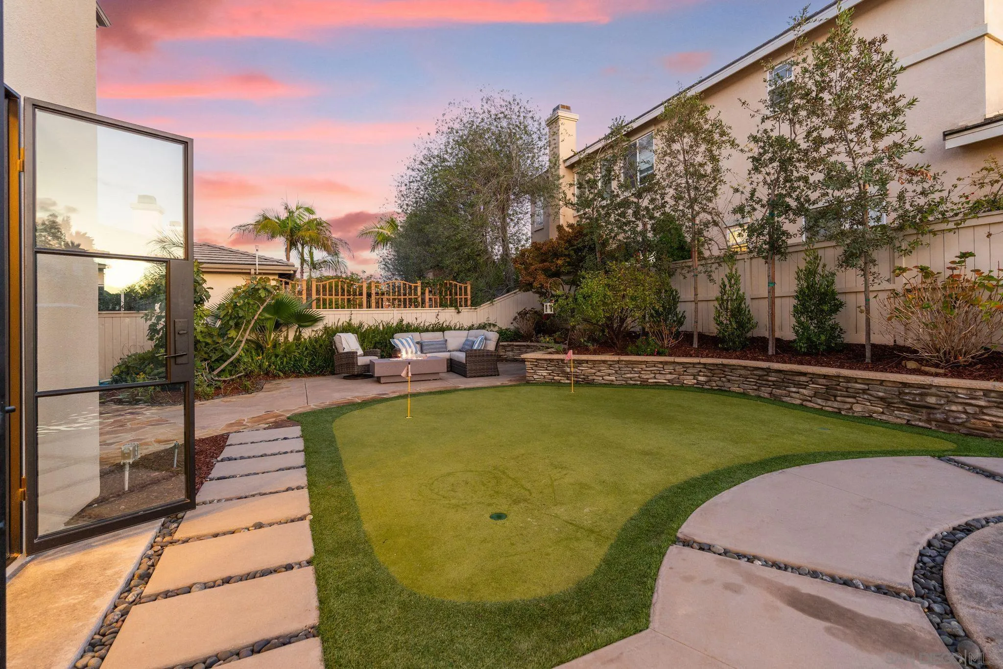 2887 Corte Morera Carlsbad, CA 92009 - Photo 62 of 68 a view of a swimming pool with a patio