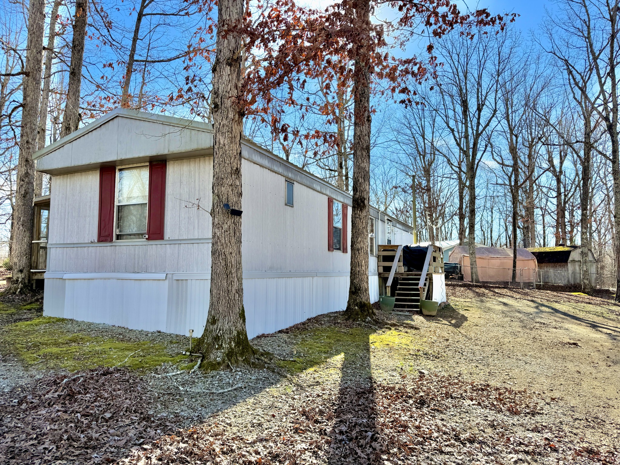 299 Sunset Drive Holladay, TN 38341 - Photo 23 of 27 a view of a house with a yard