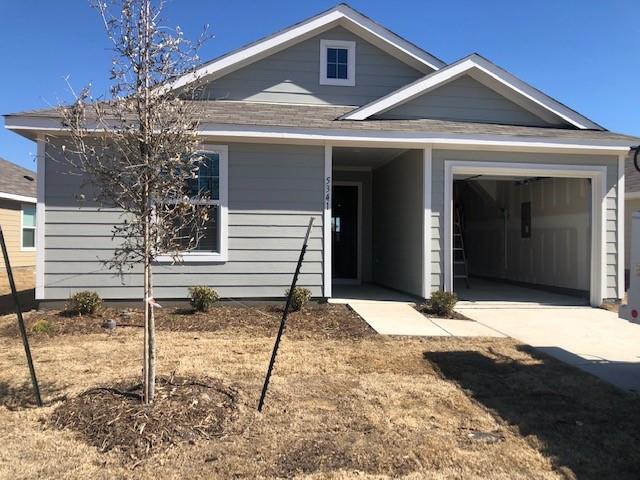 Undisclosed Address Princeton, TX 75407 - Photo 1 of 23 a front view of a house with a garage
