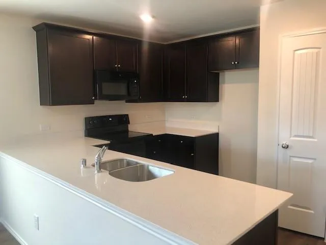 a view of kitchen and window