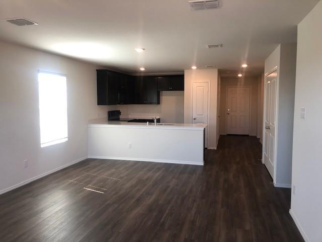 Undisclosed Address Princeton, TX 75407 - Photo 4 of 23 a view of kitchen with microwave and cabinets
