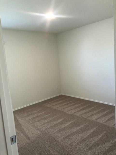 Undisclosed Address Princeton, TX 75407 - Photo 5 of 23 an empty room with a bench