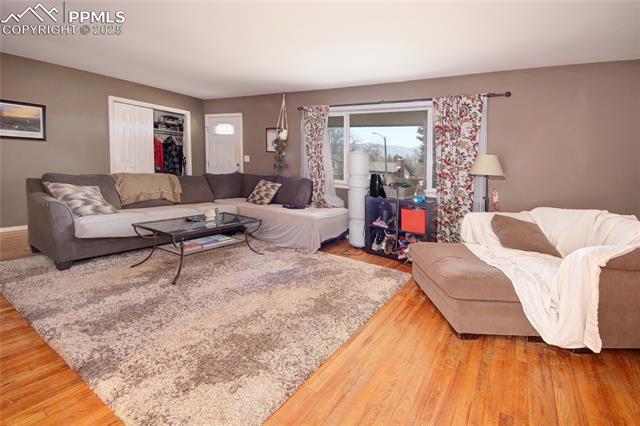 Living room featuring wood finished floors