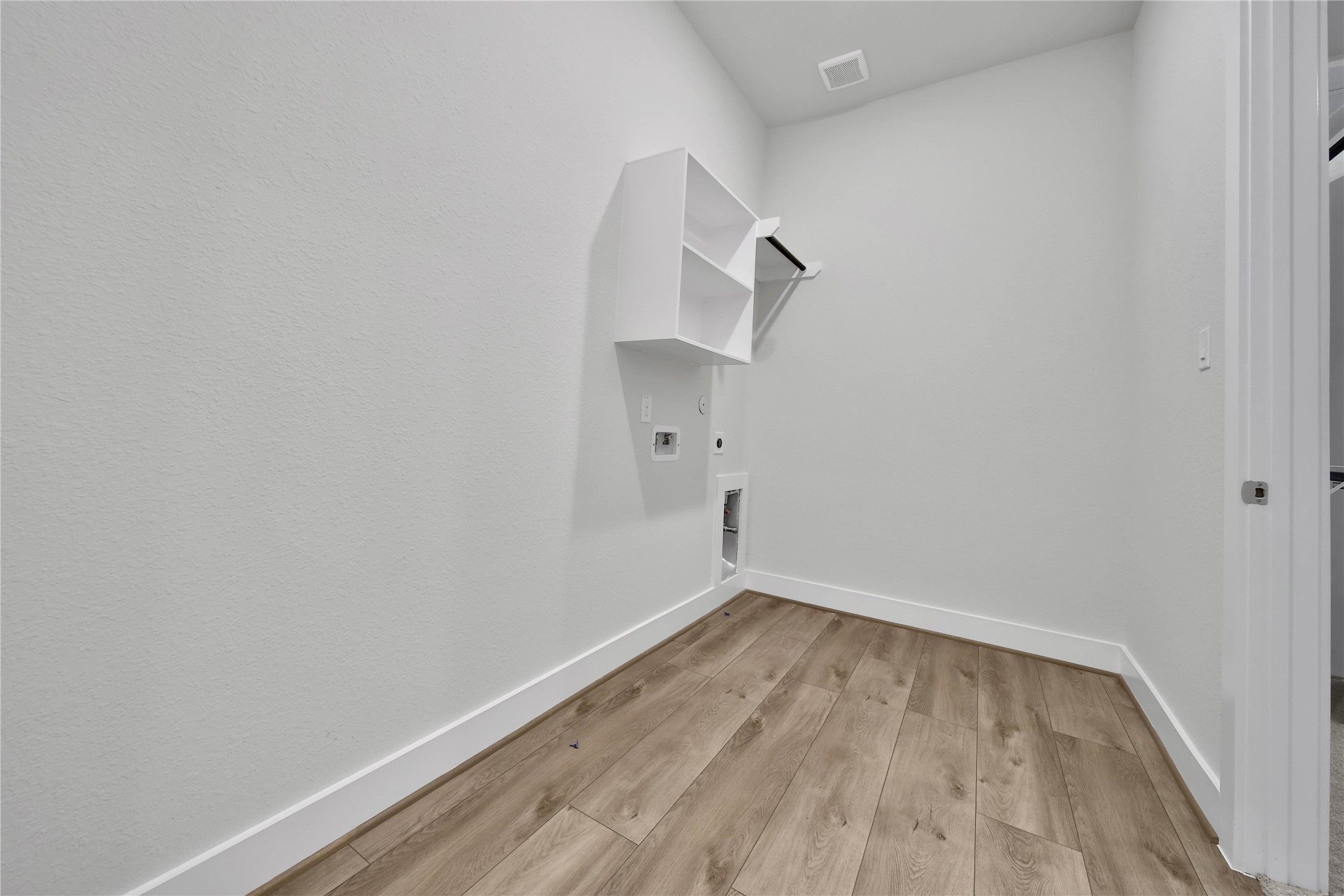 4602 Magnolia Bend Drive Rosharon, TX 77583 - Photo 28 of 39 a view of a room with wooden floor and white walls