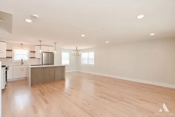 a view of kitchen with wooden floor
