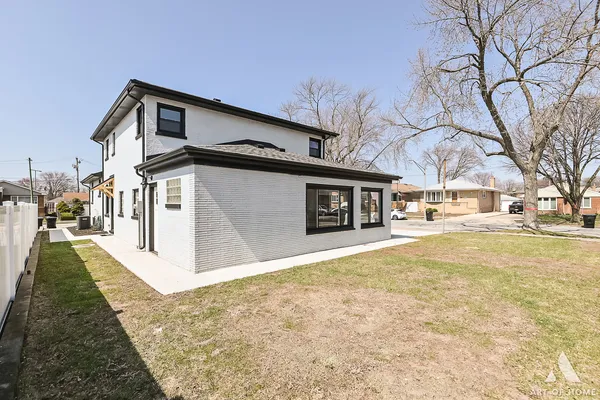 a view of backyard porch with seating space