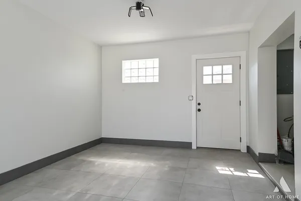 an empty room with windows