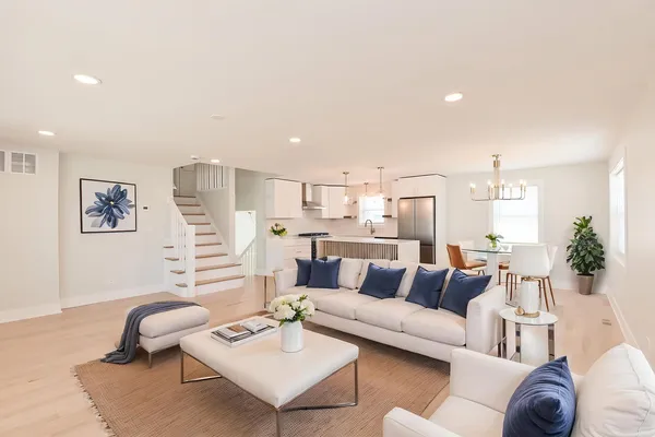 a living room with furniture and a rug