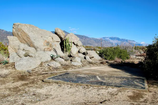 a view of a backyard of a house