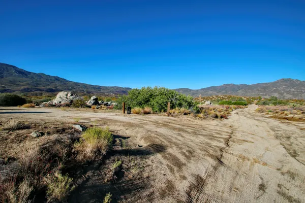 a view of mountain with lake view
