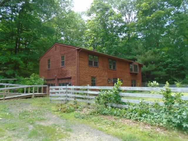 a house view with a garden space