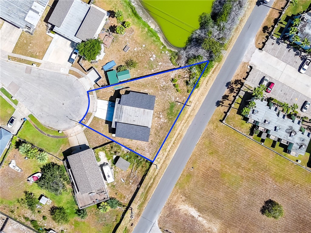 302 Easy Street, Unit B Corpus Christi, TX 78418 - Photo 27 of 27 an aerial view of a house outdoor space and street view
