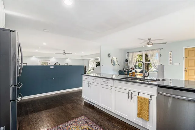 a kitchen with sink and window