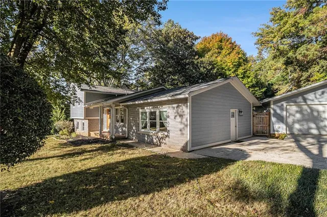 a house with trees in the background