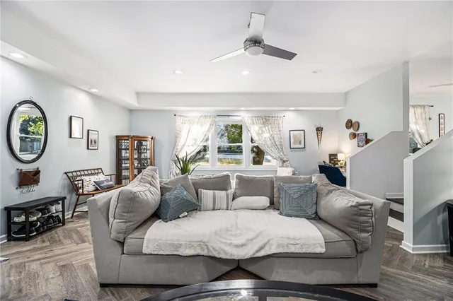 a living room with furniture and a window