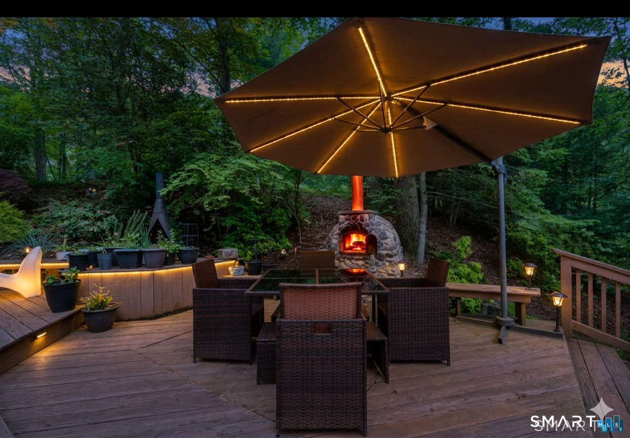 13 Alewives Road Norwalk, CT 06850 - Photo 8 of 40 Outside eating area, night time