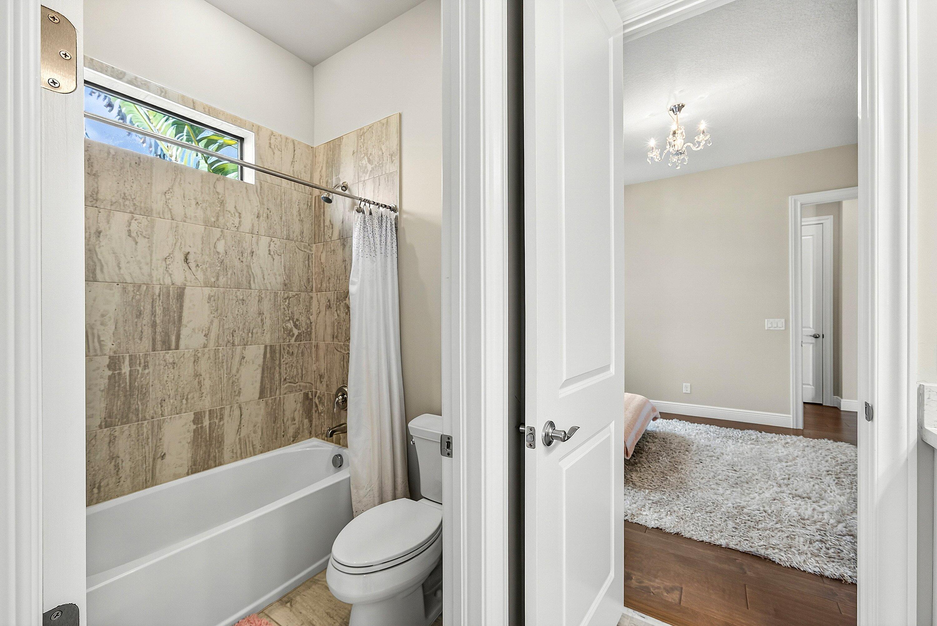 2600 Northwest 69th Street Boca Raton, FL 33496 - Photo 48 of 62 Jack N Jill Bathroom