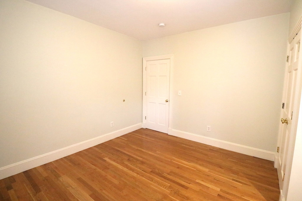 8 Caldwell Avenue, Unit 2 Somerville, MA 02143 - Photo 14 of 16 a view of empty room