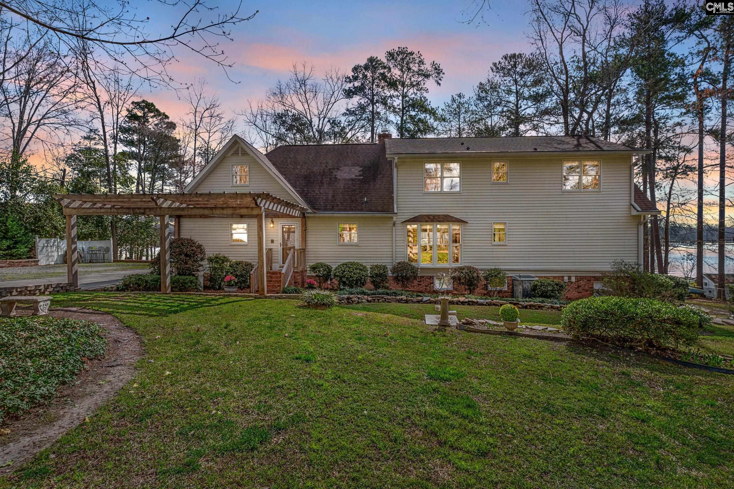 115 Rocky Ridge Road Leesville, SC 29070 - Photo 5 of 51 a front view of a house with a yard