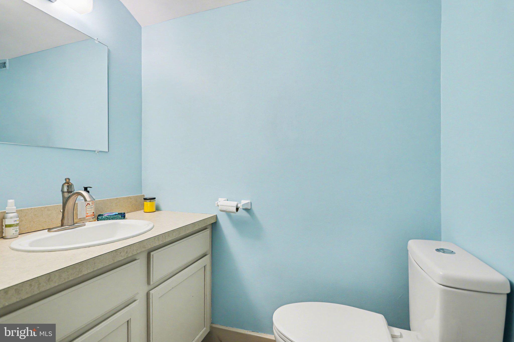 1068 Grandview Road Hanover, PA 17331 - Photo 13 of 31 a bathroom with a toilet sink and mirror