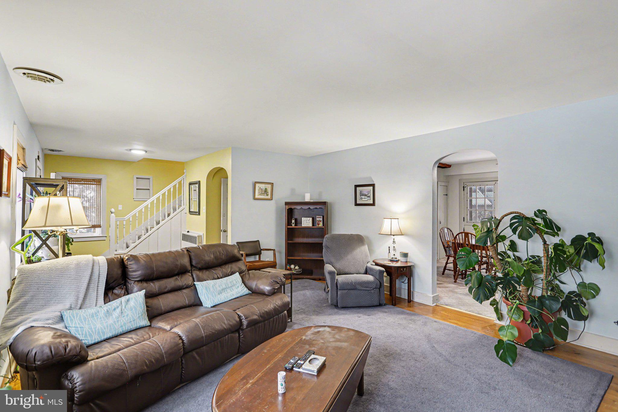 1068 Grandview Road Hanover, PA 17331 - Photo 7 of 31 a living room with furniture and a potted plant