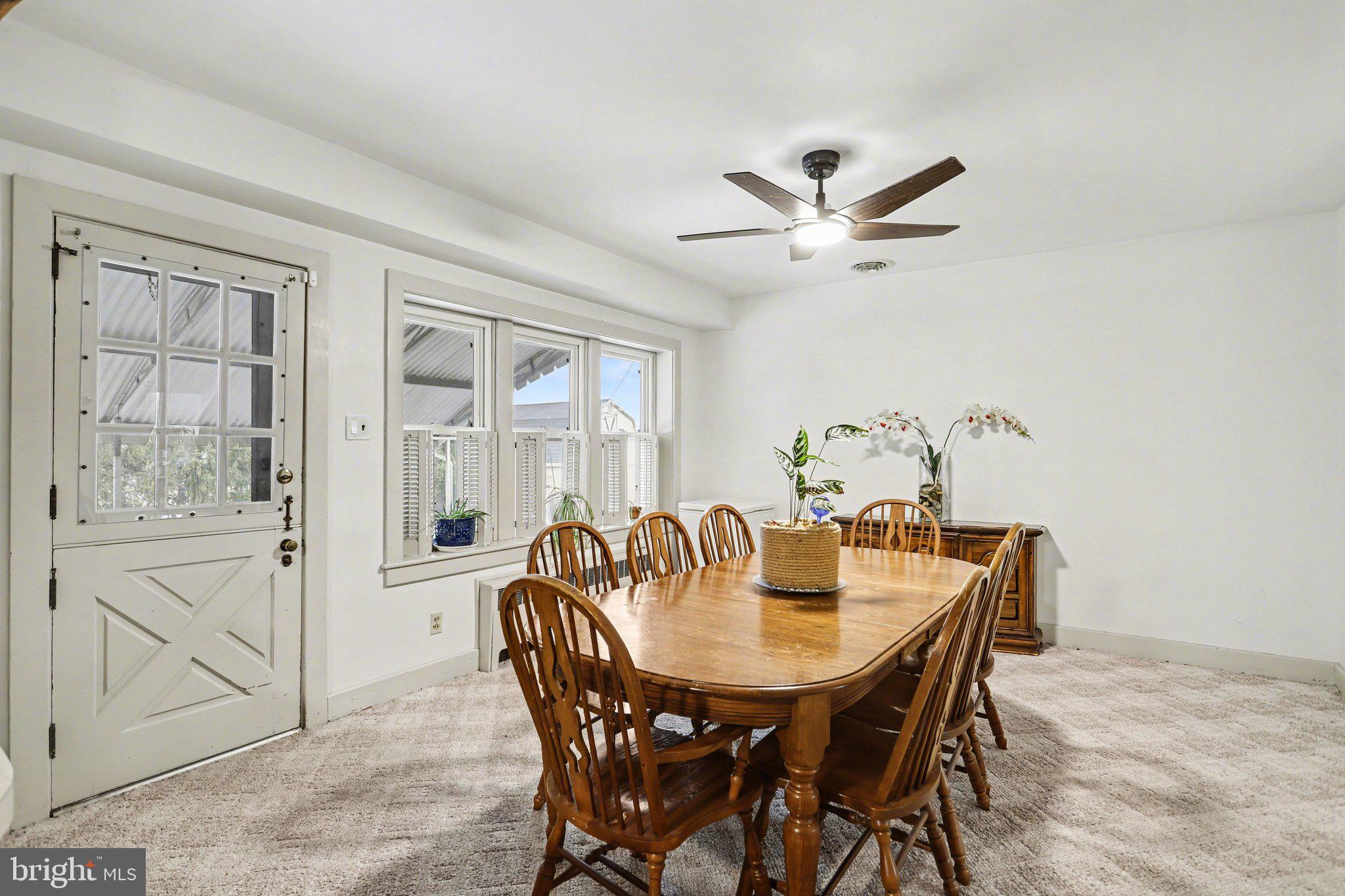 1068 Grandview Road Hanover, PA 17331 - Photo 9 of 31 a view of a dining room with furniture and a chandelier fan