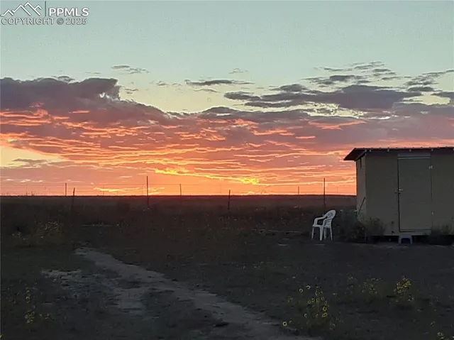 a view of an ocean and a mountain