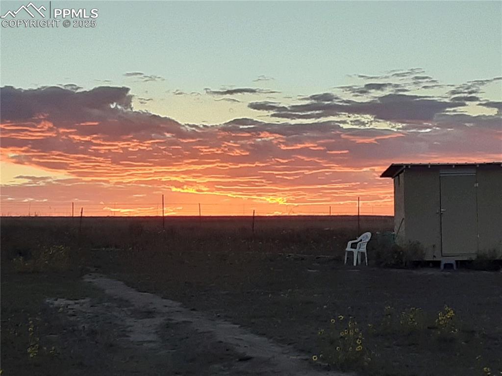 a view of an ocean and a mountain