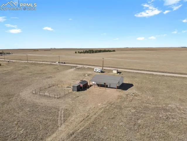 a view of an empty room with a ocean view