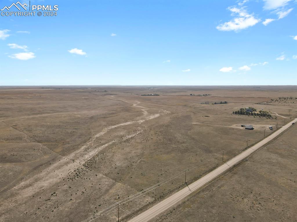 12155 Oil Well Road Calhan, CO 80808 - Photo 16 of 25 a view of an empty room with a ocean view