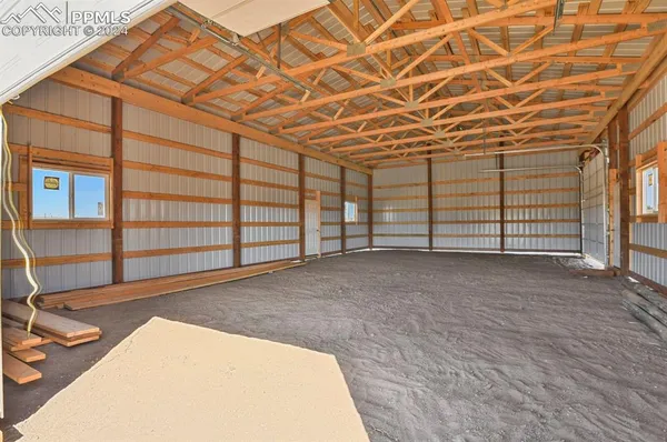 a view of a yard with an empty space