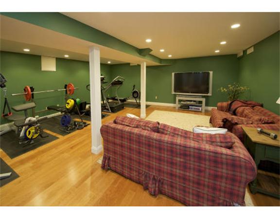 97 Cherry Brook Road Weston, MA 02493 - Photo 10 of 18 a room with furniture and a flat screen tv