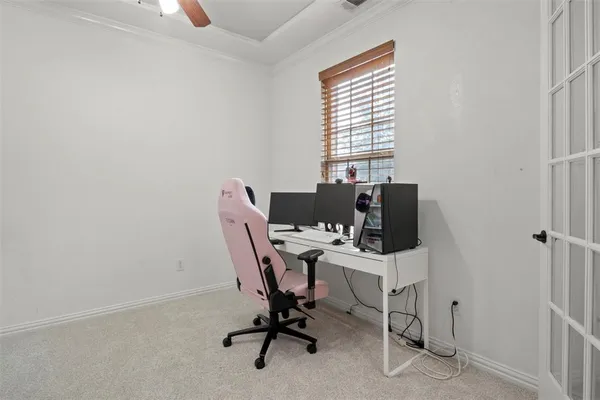 a view of a workspace with furniture