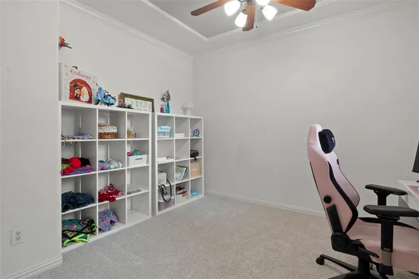 a view of a workspace with furniture
