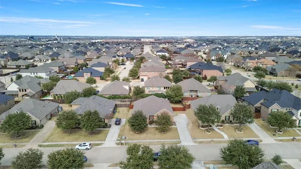 an aerial view of residential building with parking space