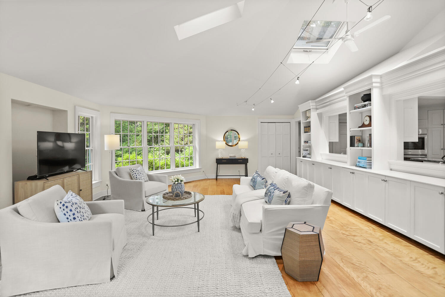 216 Turtle Back Road New Canaan, CT 06840 - Photo 15 of 38 a living room with furniture and a flat screen tv