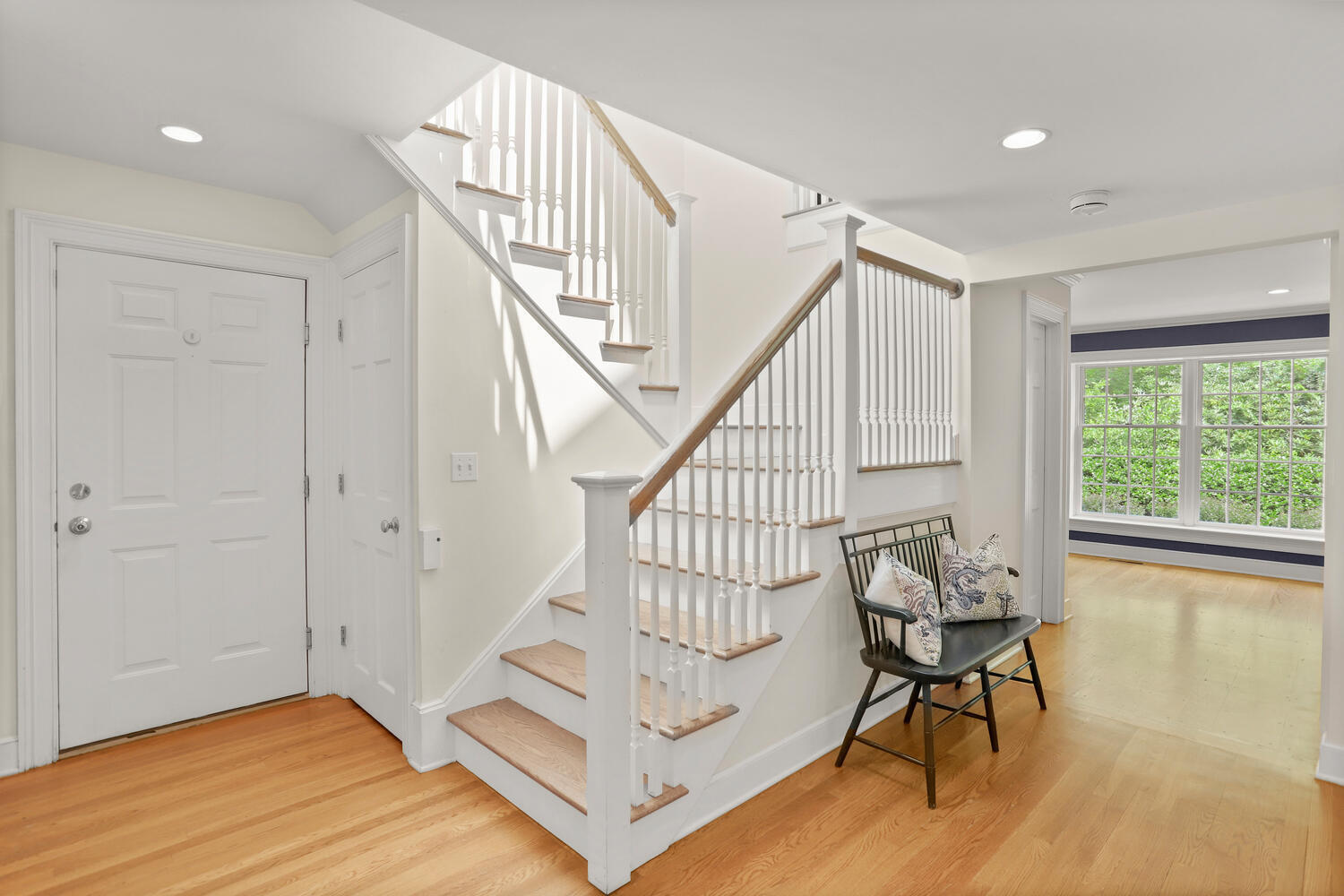 216 Turtle Back Road New Canaan, CT 06840 - Photo 16 of 38 a view of an entryway with wooden floor and windows