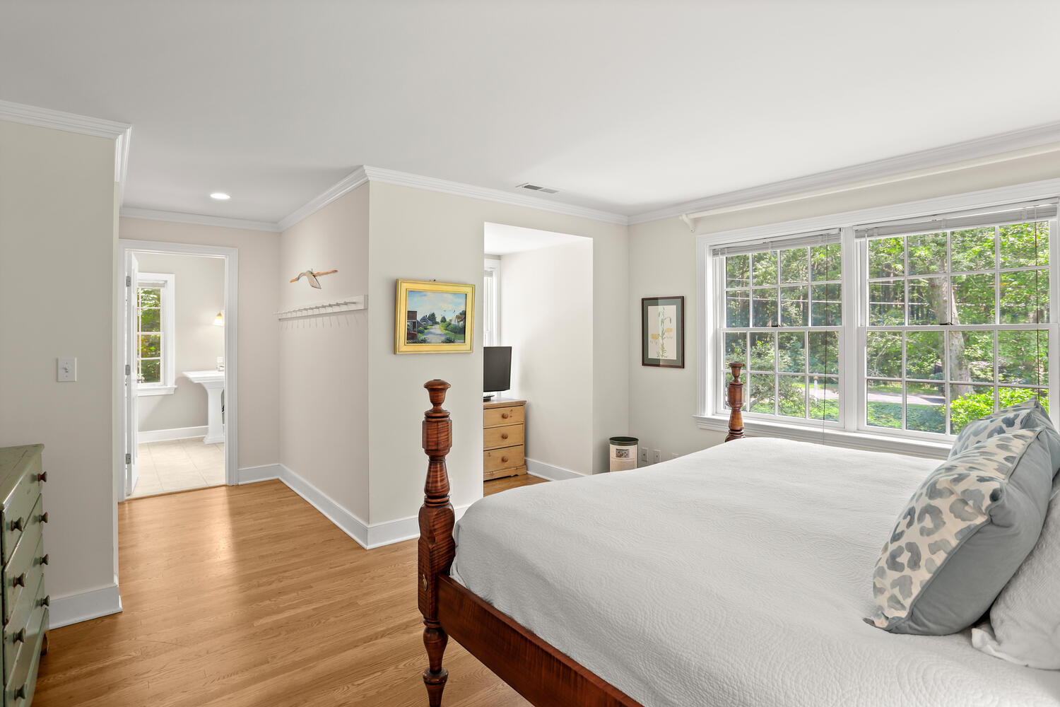 216 Turtle Back Road New Canaan, CT 06840 - Photo 21 of 38 a bed sitting in a spacious bedroom next to a window